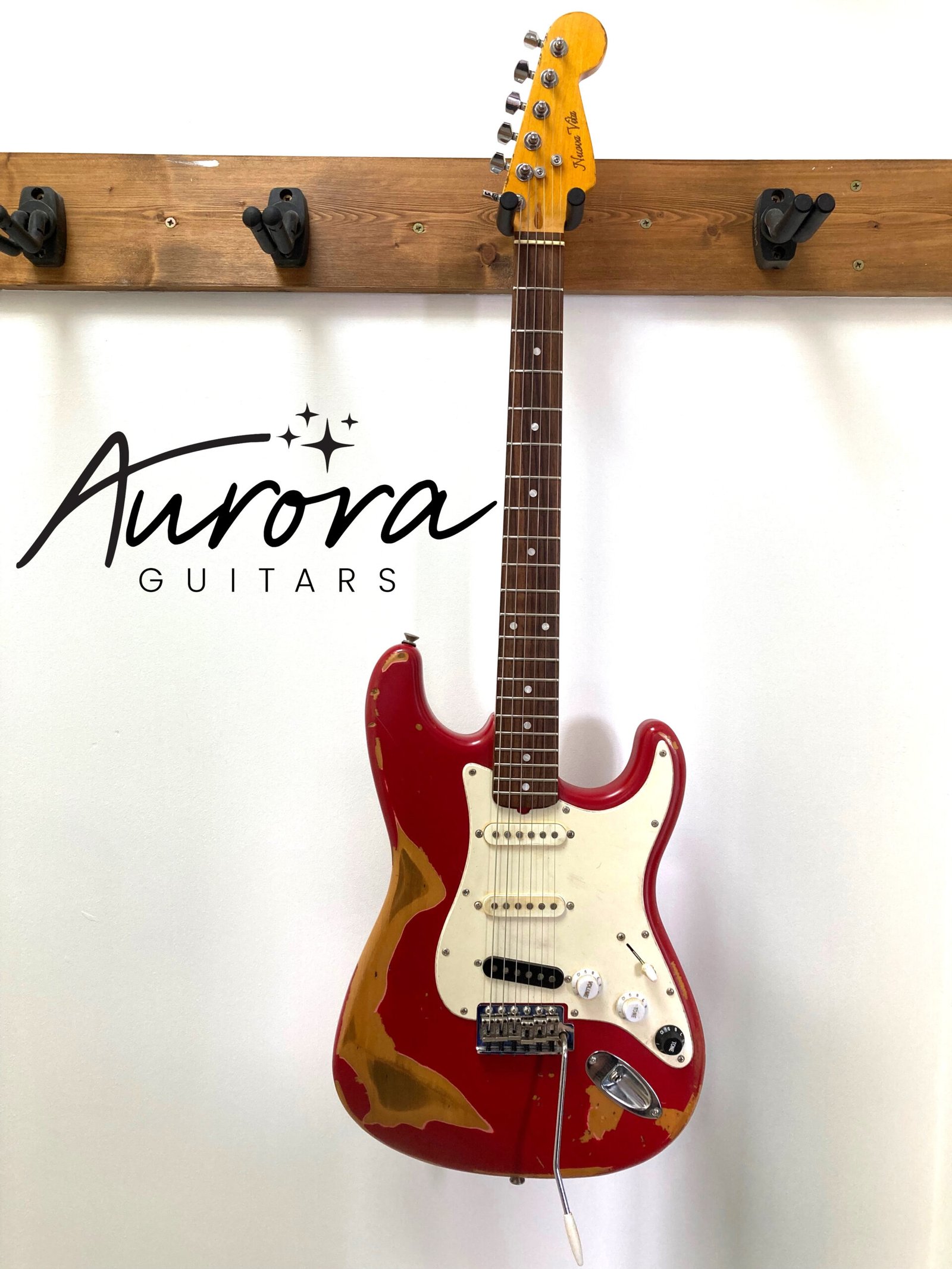 Nuova Vita red heavy relic nitro finish electric guitar with Iron Gear and Fat City Strat pickups
